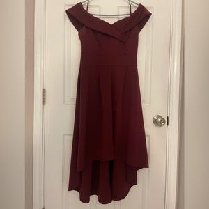 Burgundy dress, starts at knee ends at ankle, has pockets, off shoulder